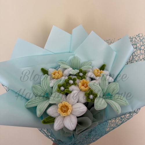 Delicate bouquet of daffodils and lilies custom made in pastel colors