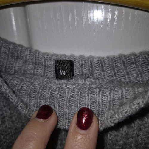 Gray pullover with large rhinestones medium size like new