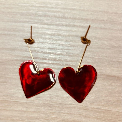 Heart-shaped earrings red like new