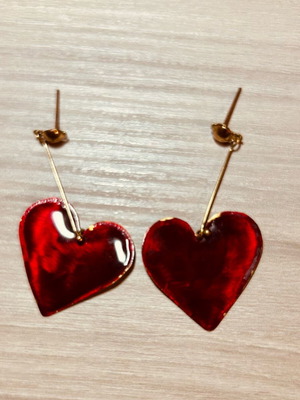 Heart-shaped earrings red like new