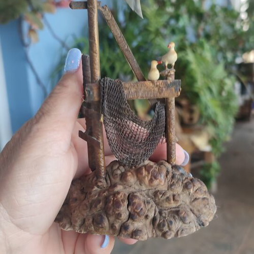 Vintage sea-themed decoration handmade from metal and cork used
