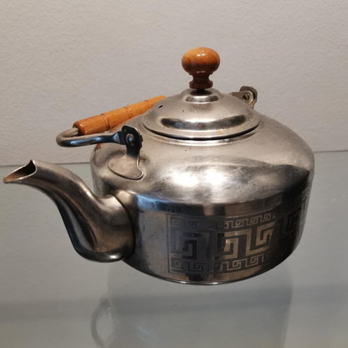 Teapot used with wooden handle and meander pattern