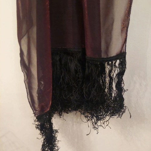 Dark brown scarf used with shimmer and fringes