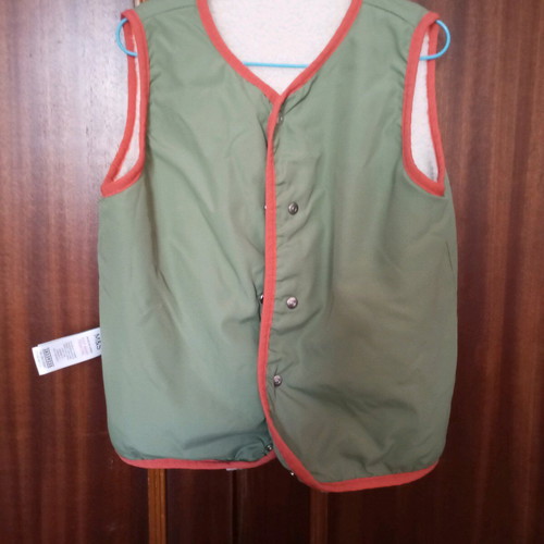 Children's vest like new, green, size 122 cm