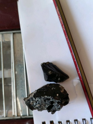 Obsidian set new with greenish iridescence