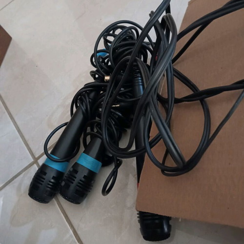 Sony PlayStation 2 used with 4 microphones and 4 games