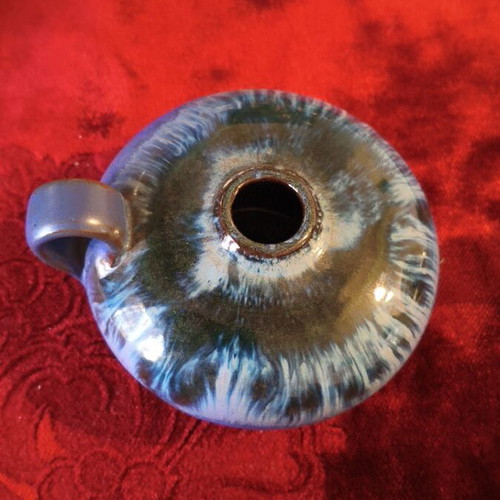 Handmade ceramic candlestick with reactive glaze finish
