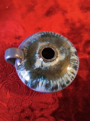 Handmade ceramic candlestick with reactive glaze finish