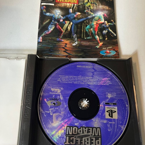 Perfect Weapon PlayStation (PS1) used with discoloration on cover