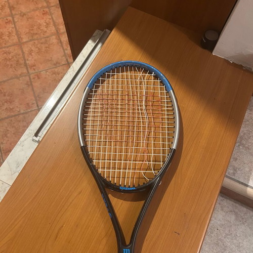 Wilson Ultra Power 100 tennis racket used with 2 broken strings