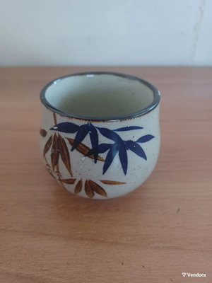 Small ceramic decorative container used