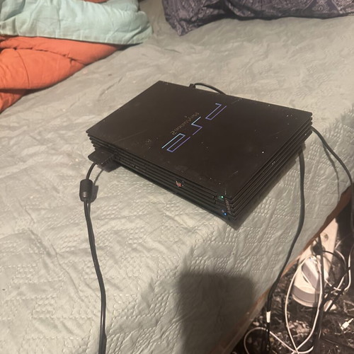 PlayStation 2 (PS2) console used with 2 games, complete