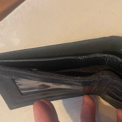 Leather wallet used with many compartments and slim design