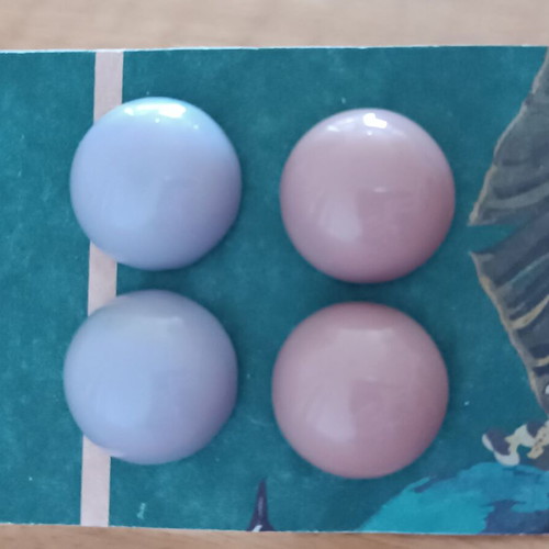 Plastic stud earrings set in lilac and dusty apple colors like new
