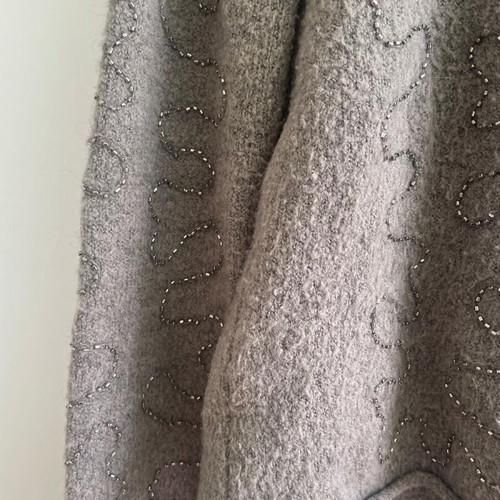 Gray knitted sweater with rhinestones used, asymmetric hem