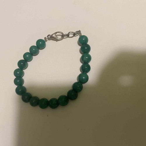 Bracelet with green beads and safety clasp like new