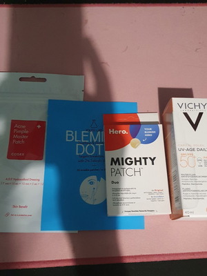 Set skincare with pimple patches and sunscreen, like new