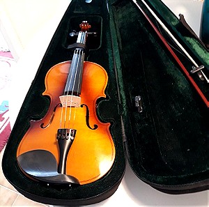 Ένα όμορφο βιολί με την θήκη του ελαφρώς μεταχειρισμένο.