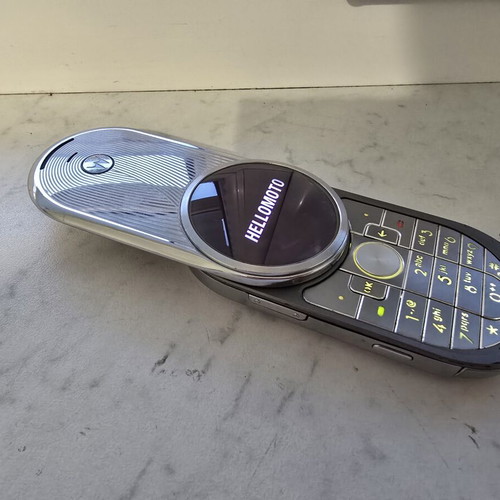 Motorola Aura R1 used, gray phone with smooth mechanism
