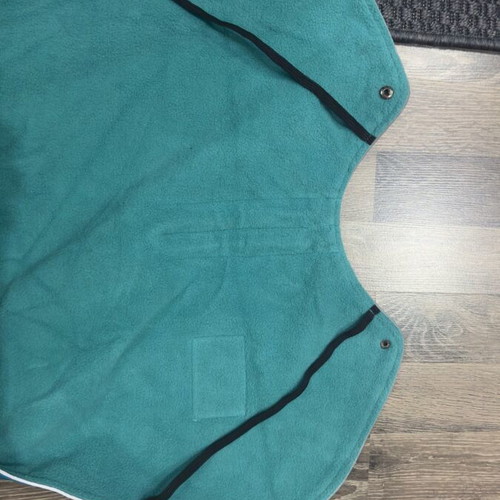 Waterproof dog jacket like new with fleece lining in petrol color