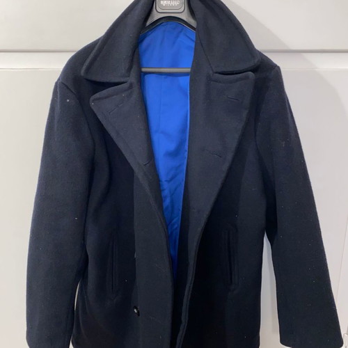 Navy coat authentic with collectible buttons from 1998