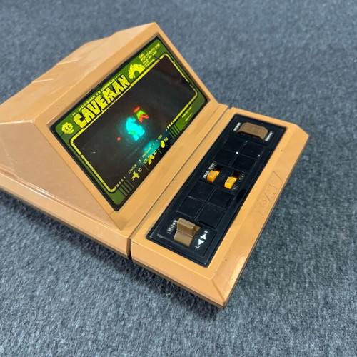 Tomy Jr. Caveman vs Dinosaur vintage electronic game
