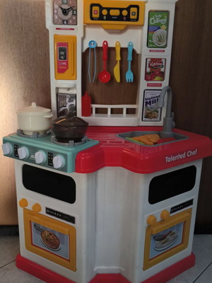 Play Kitchen used, plastic with light, music, and steam