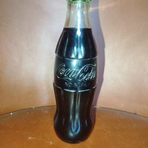 Coca-Cola collectible glass bottle like new from 70s-80s with original cap