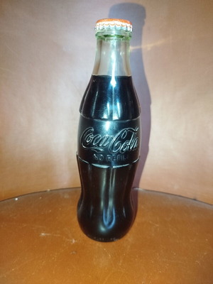Coca-Cola collectible glass bottle like new from 70s-80s with original cap