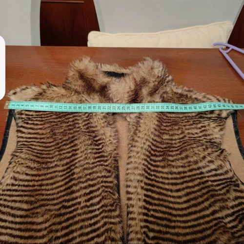 Synthetic fur vest brown like new with decorative zipper