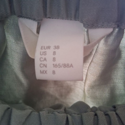 H&M blouse pistachio like new with ruffles on sleeves