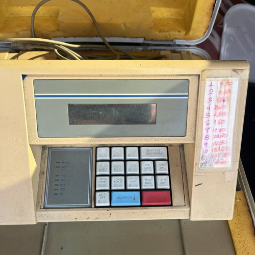 OPAP machine for tickets used, with case