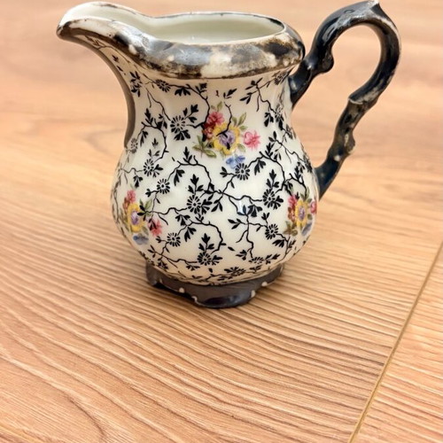 Small vintage Bavaria porcelain jug used with silver decoration