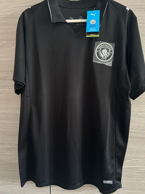 Manchester City football jersey official replica, new, size L