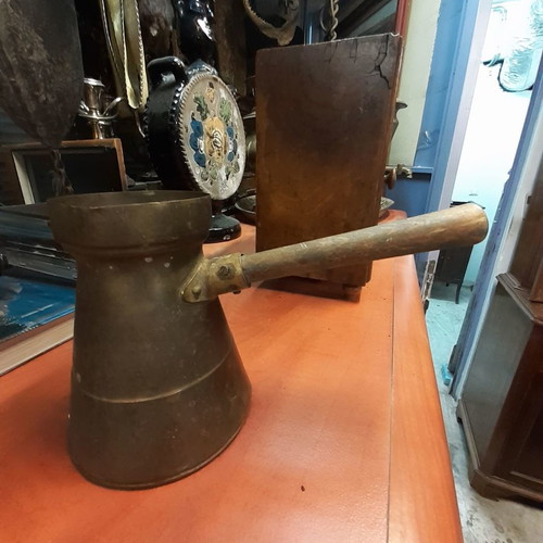 Electric brass briki used with wooden handle