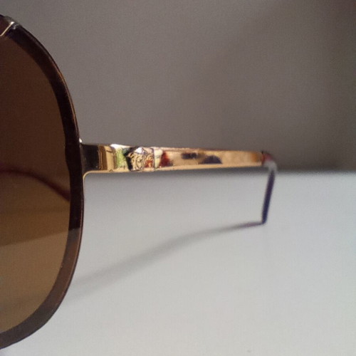 Versace vintage sunglasses unisex used, gold color
