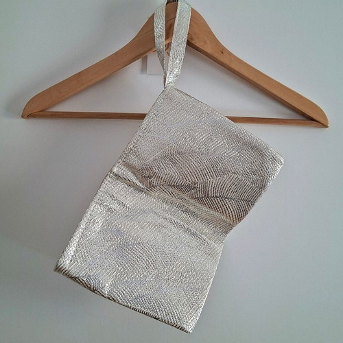 Waterproof toiletry bag, new with tags, white and silver