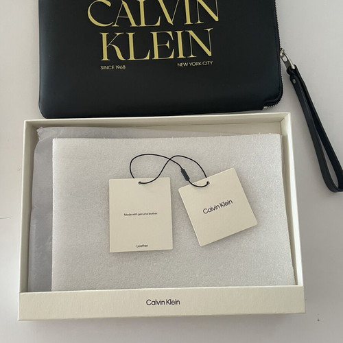 Calvin Klein graphic wristlet pouch, black and yellow
