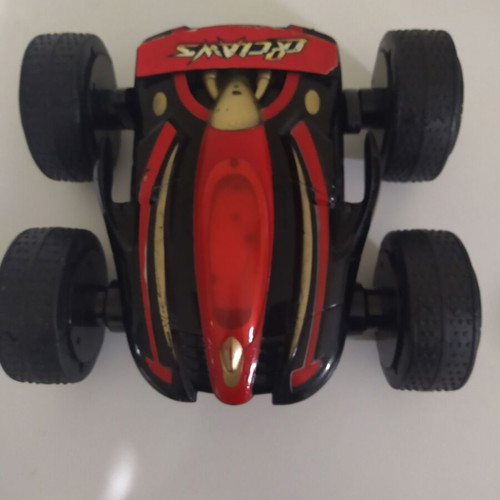 Remote control used with wheels that open to overcome obstacles