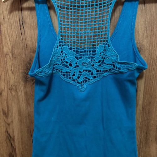 Blue sleeveless T-shirt used, size M/L with back design