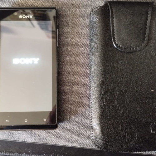 Sony Xperia J (ST26i) used, for parts with original BA900 battery