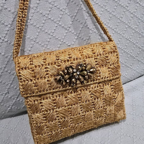 Women's handheld evening bag handmade from gold thread like new