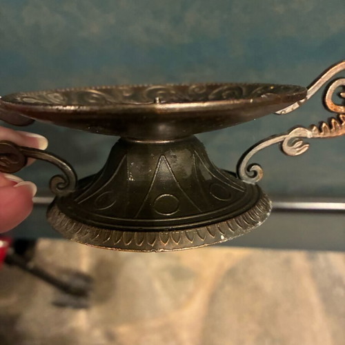 Vintage brass candlestick used with geometric and classic designs