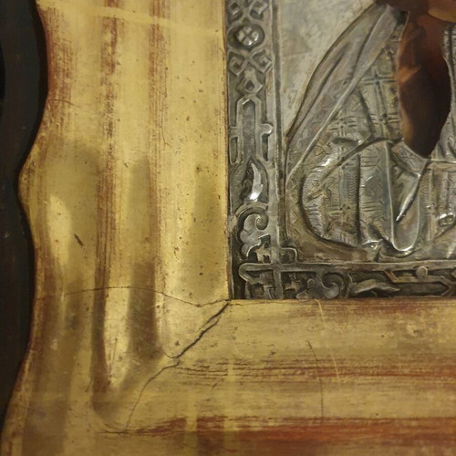 Old Russian Jesus Icon used in wooden frame with glass
