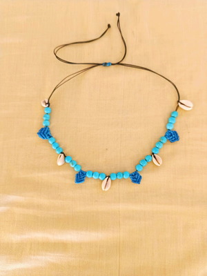 Handmade necklace new with semi-precious turquoise beads, shells and macrame