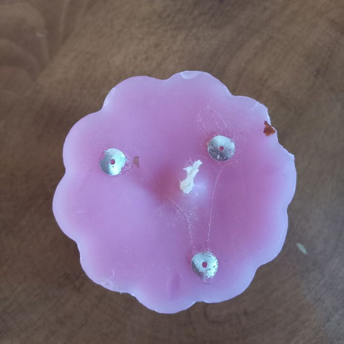 Pink candle like new, flower shape, light rose scent