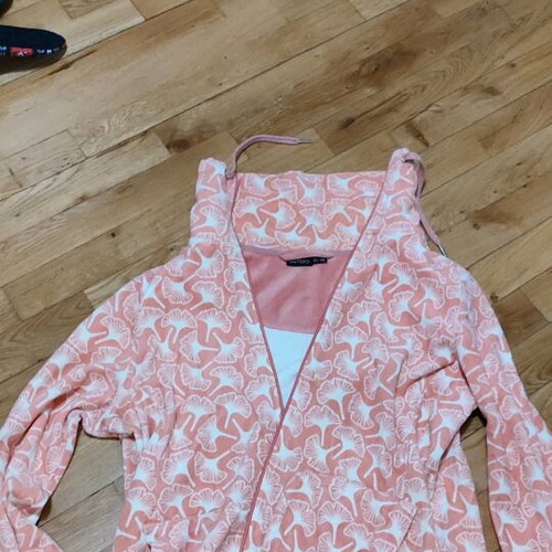 Pink cardigan used with white patterns and zipper, size L