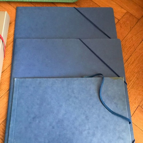 Plastic bag, thick plastic folders, cardboard folders and slides like new