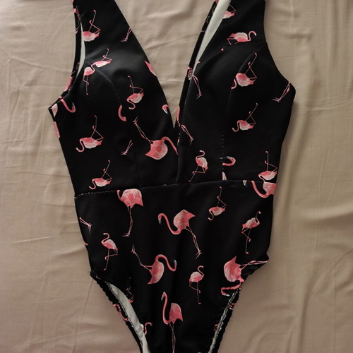 One-piece swimsuit with flamingo pattern, new, size Small, black and pink