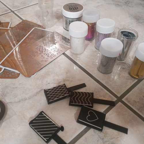 Nail art kit with tips, stamping plates and accessories